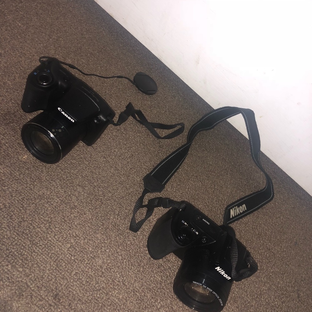 Cannon/Nixon Cameras Perfect Condition !